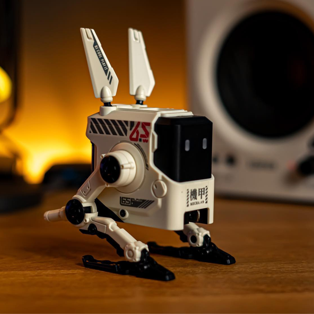 Toy robot with a futuristic design on a wooden surface